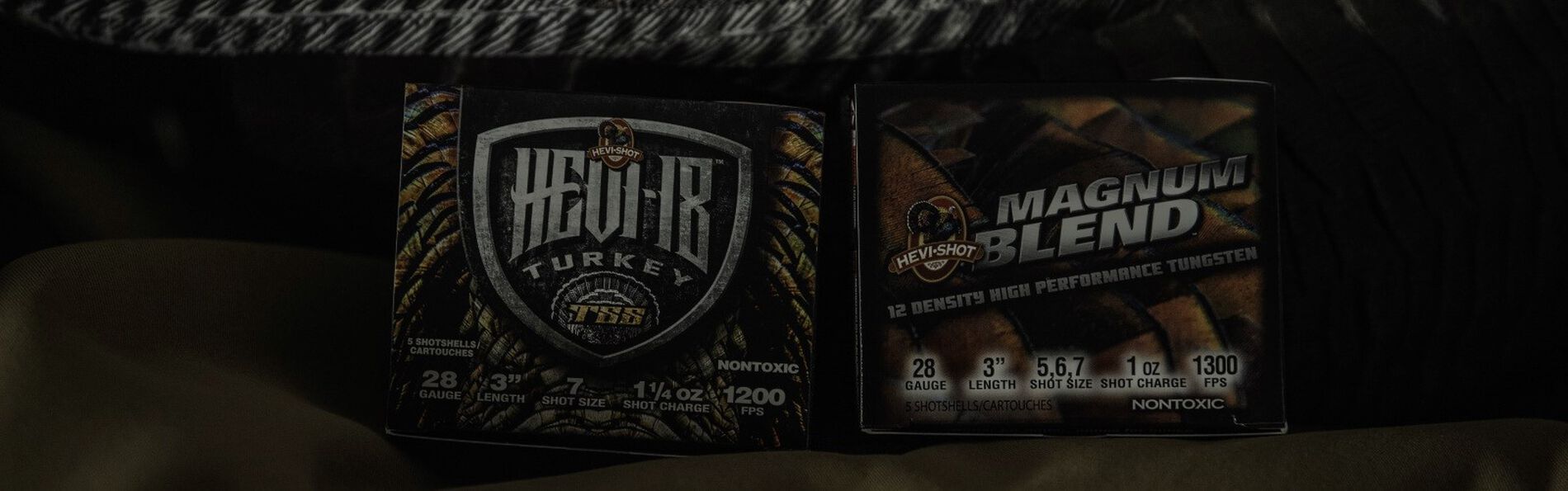 Box of HEVI-18 and Magnum Blend next to a dead turkey