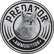 metal disk with a Coyote saying Predator Ammunition