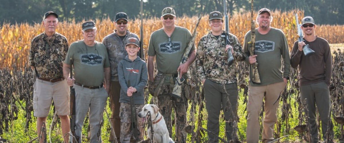 group of hunters standing outside